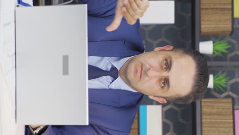 Vertical-video-of-Businessman-looking-at-camera-with-negative-gesture.
